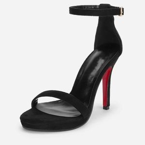 Women’s open toed high heel.
